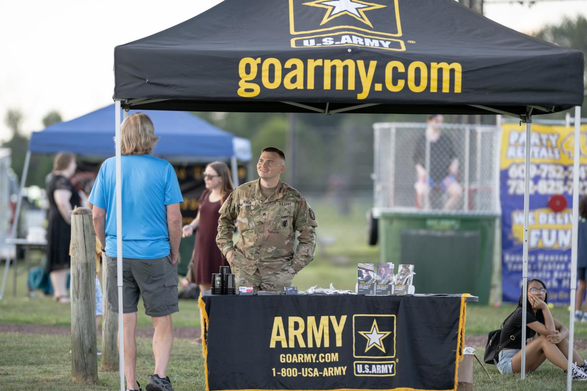 ARMY tent with Staff Sergeant Newlin representing