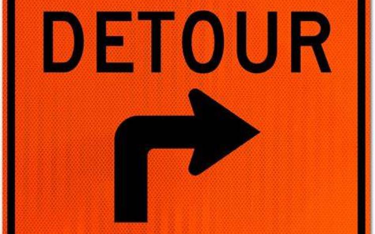 Orange detour sign